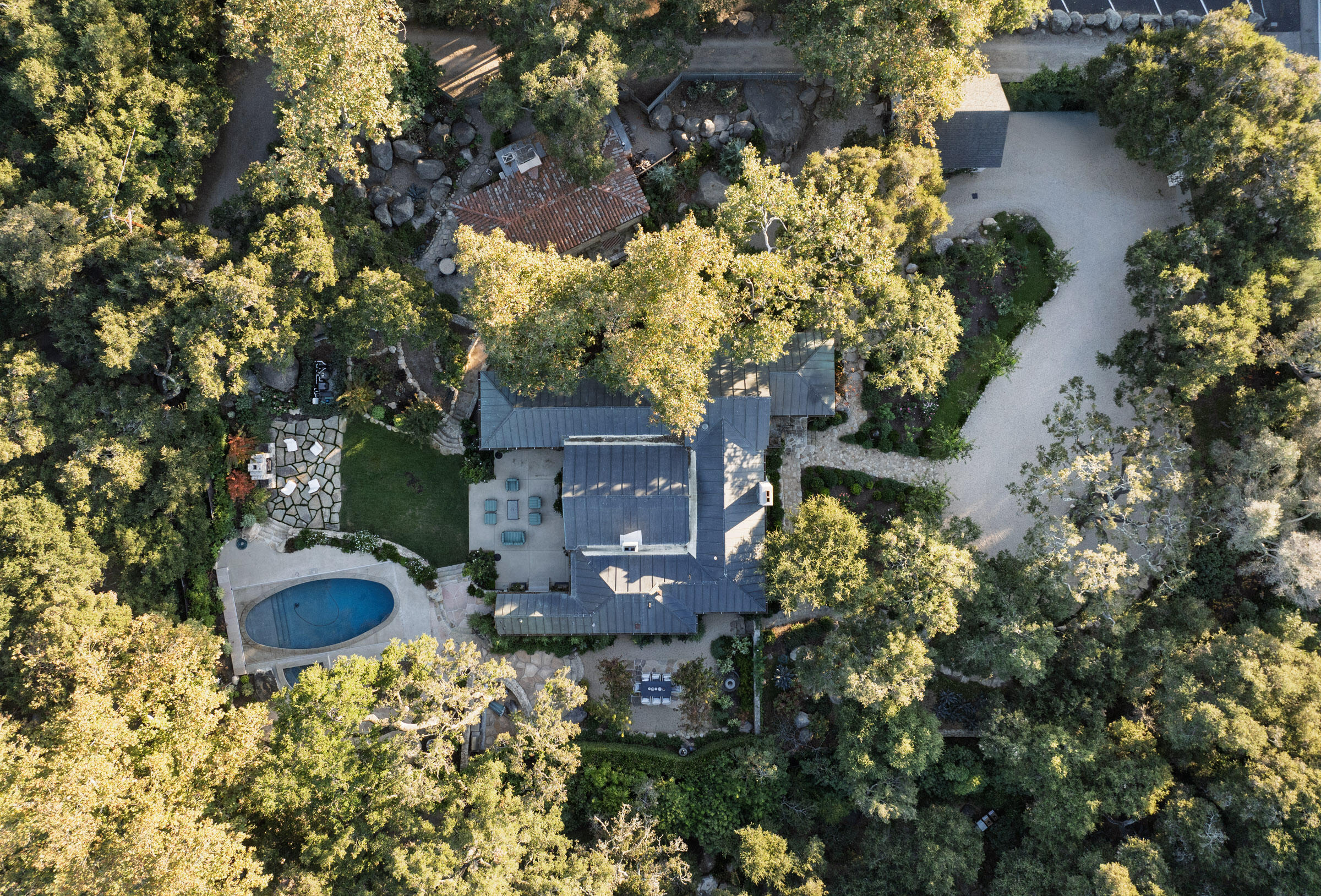 700 Mission Canyon Road Santa Barbara, CA 93105 - Photo 41 of 44 an aerial view of a house with a yard and garden