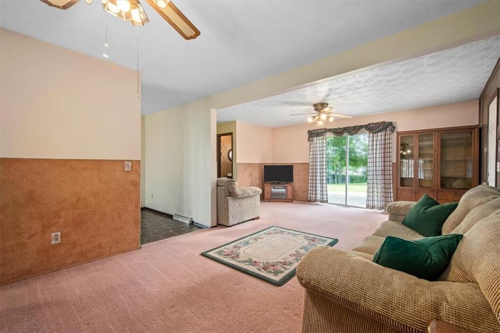 756 Charles Street Rochester, PA 15074 - Photo 11 of 25 a living room with furniture and large windows