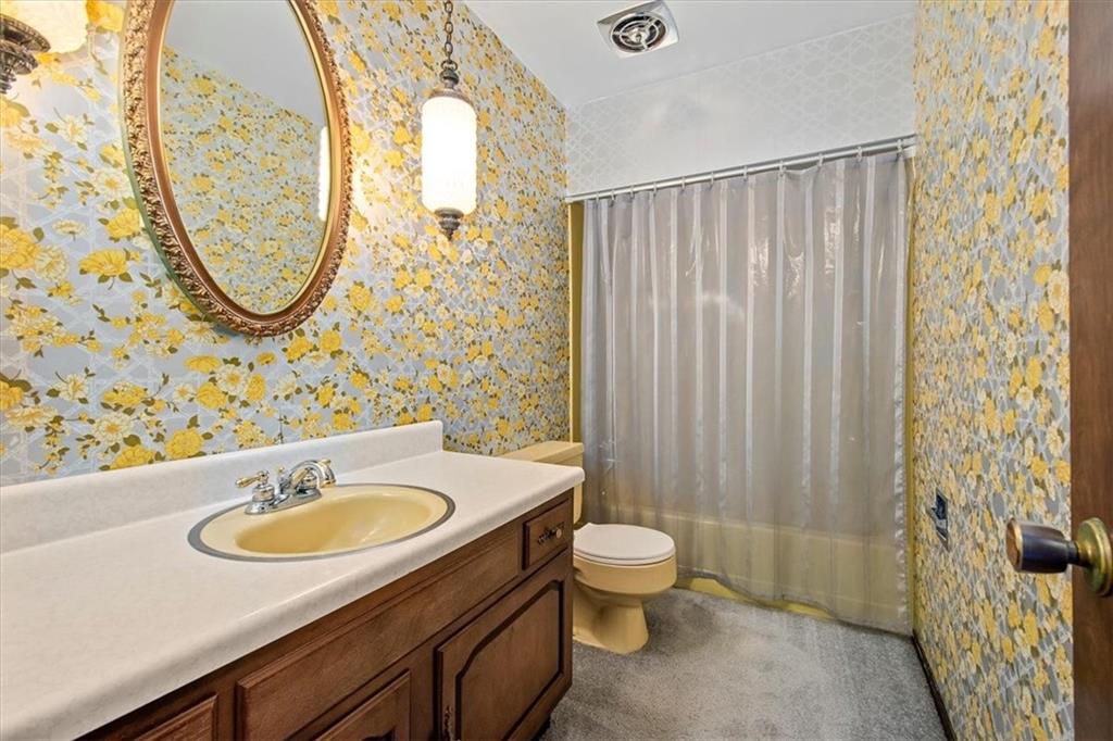 756 Charles Street Rochester, PA 15074 - Photo 18 of 25 a bathroom with a sink toilet and shower