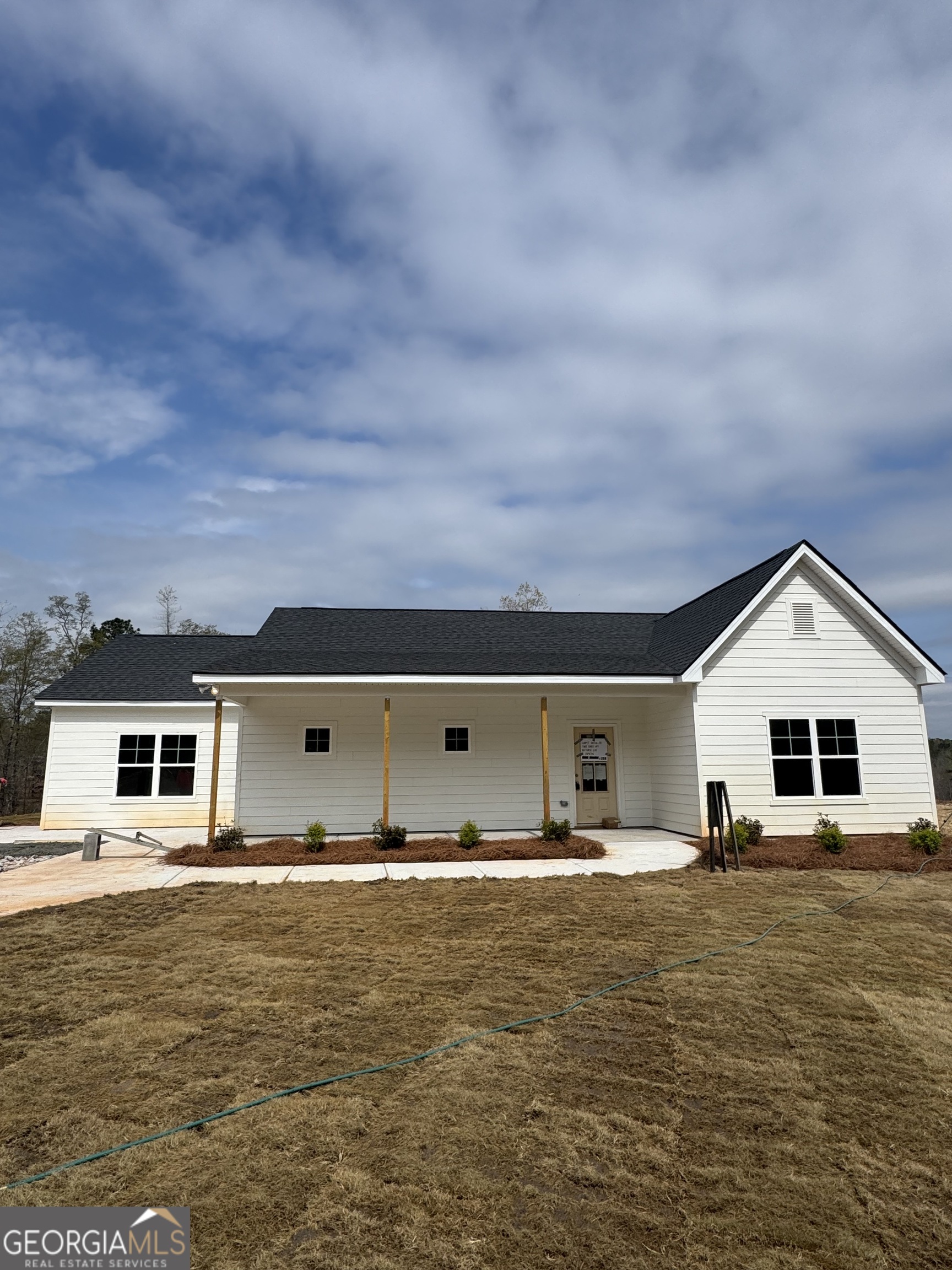 a front view of house with ocean view