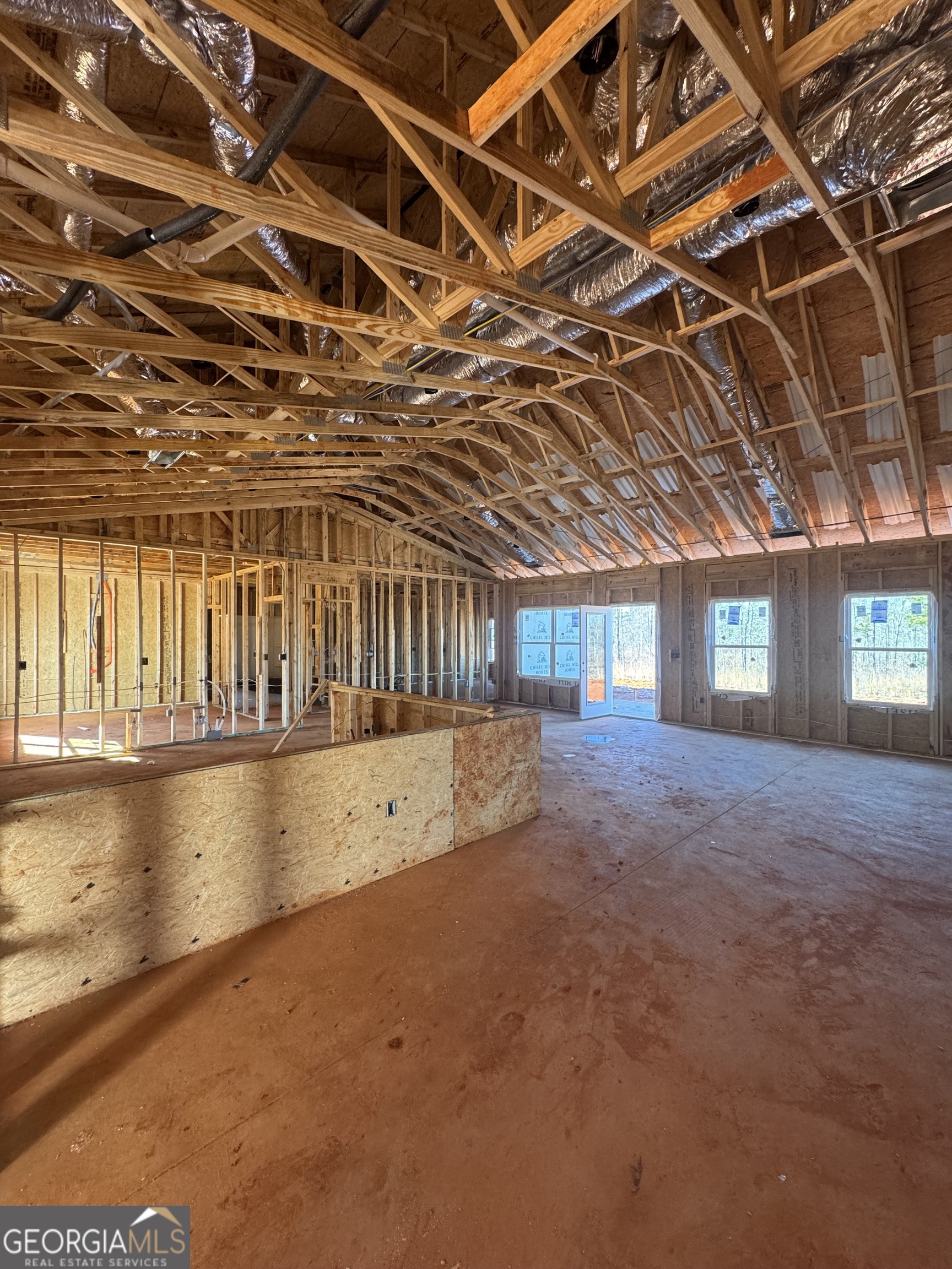 331 Andrews Mill Road Greenville, GA 30222 - Photo 3 of 7 a view of an empty room with windows