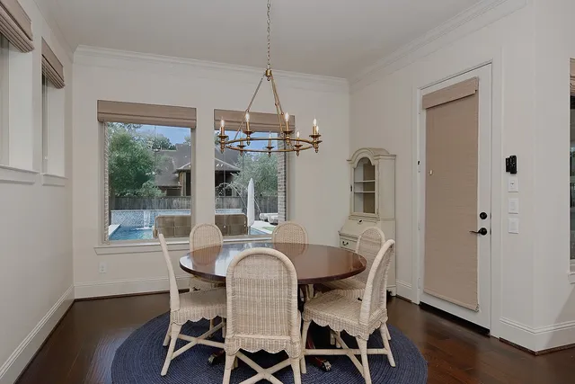 a dining room with furniture window wooden floor