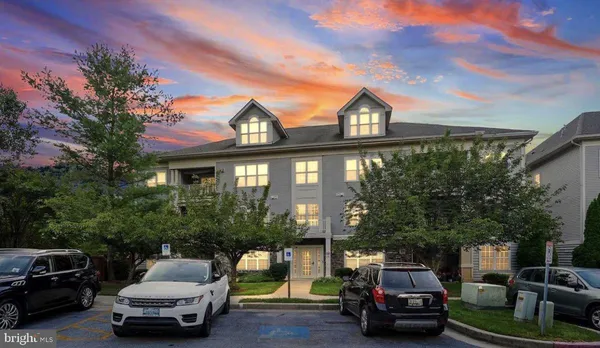 a car parked in front of a house