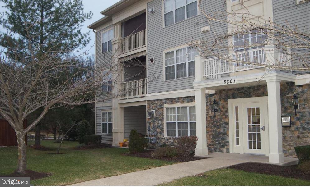8801 Stoneridge Circle, Unit T2 Baltimore, MD 21208 - Photo 2 of 24 front view of a building