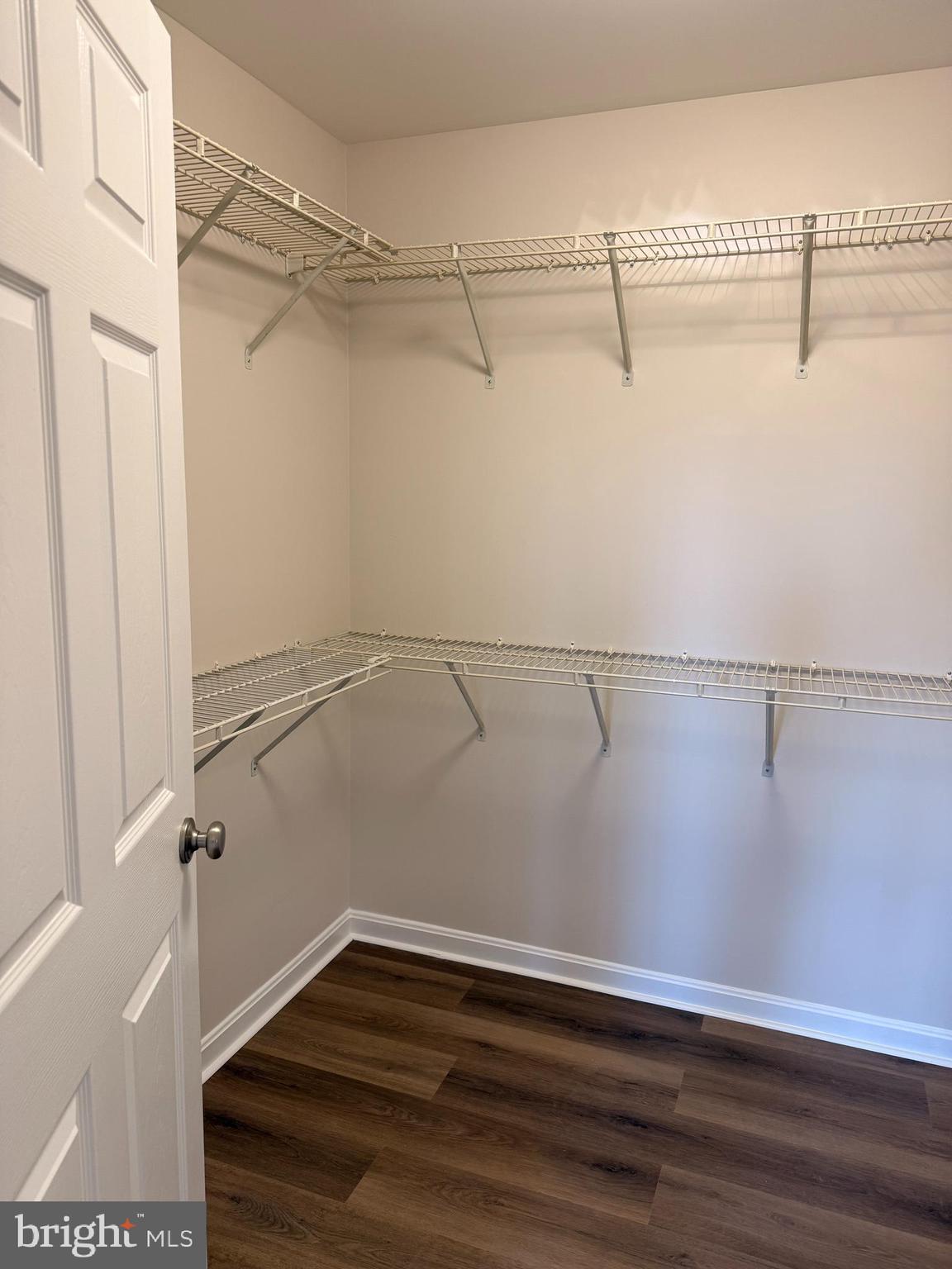 8801 Stoneridge Circle, Unit T2 Baltimore, MD 21208 - Photo 21 of 24 a view of a room with racks on the wall