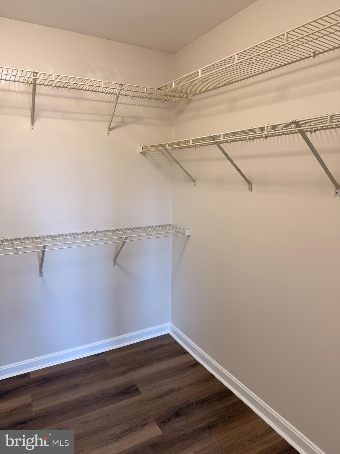 8801 Stoneridge Circle, Unit T2 Baltimore, MD 21208 - Photo 22 of 24 a view of a room with racks on the wall