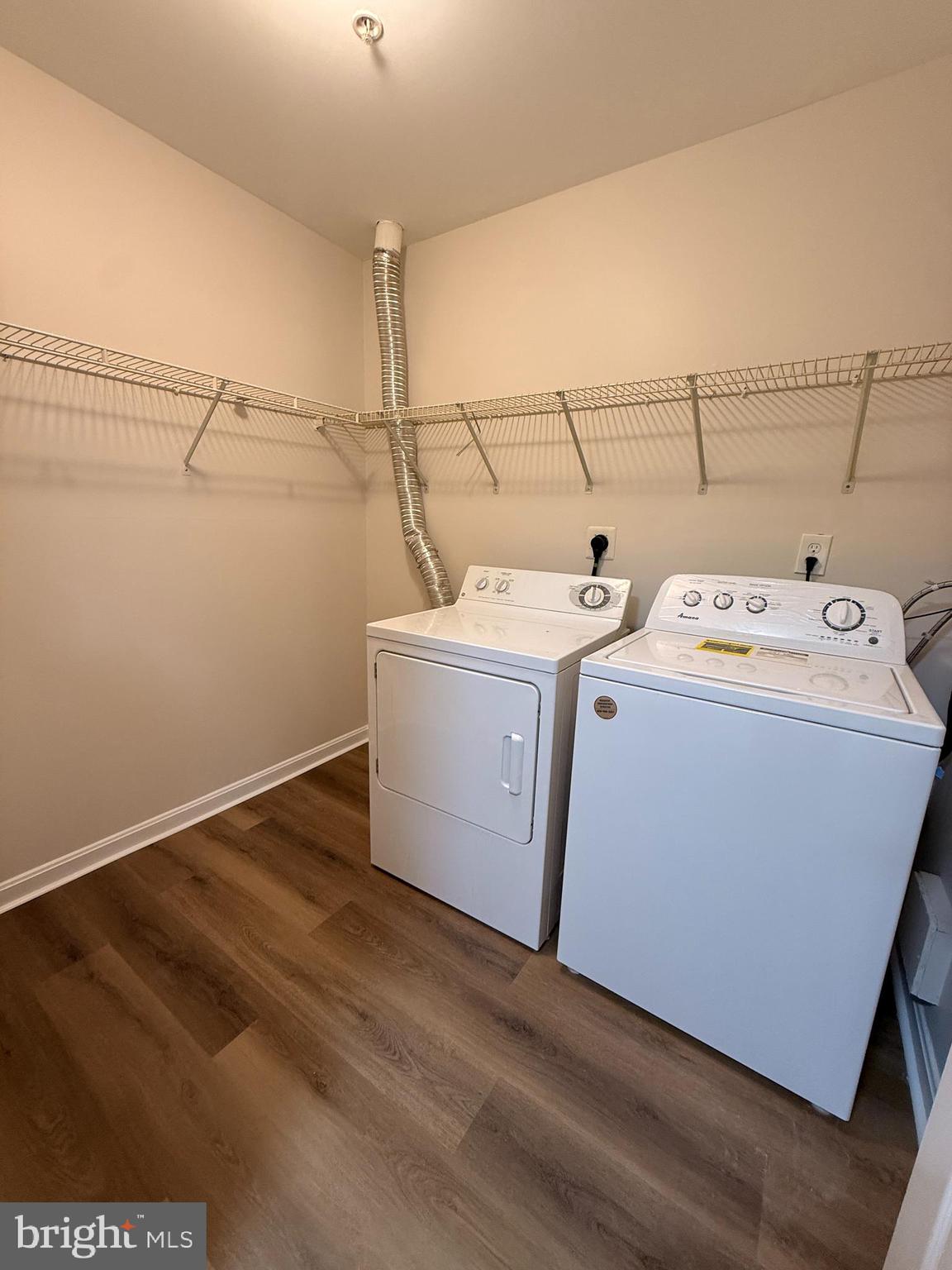 8801 Stoneridge Circle, Unit T2 Baltimore, MD 21208 - Photo 24 of 24 a utility room with dryer and washer