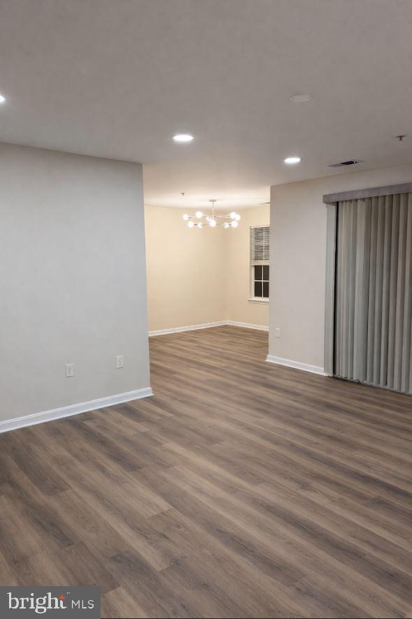 8801 Stoneridge Circle, Unit T2 Baltimore, MD 21208 - Photo 3 of 24 a view of an empty room with wooden floor