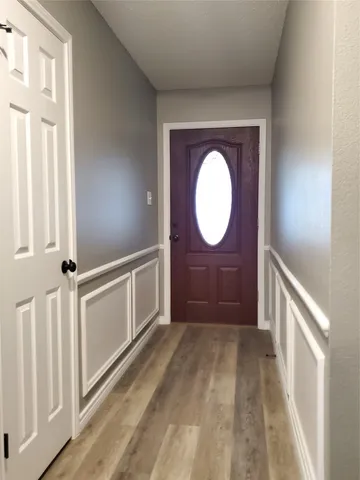 a view of a hallway with entryway