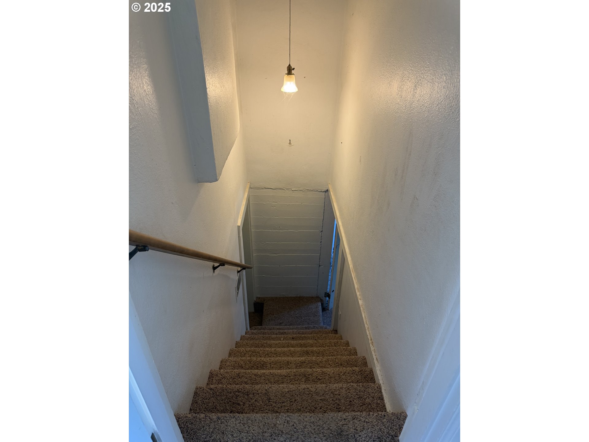 311 Northwest 11th Street Pendleton, OR 97801 - Photo 11 of 11 a view of a hallway with stairs