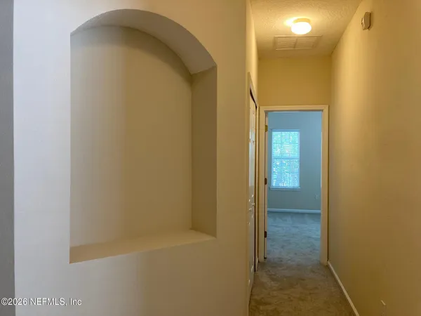 a bathroom with a tub and shower