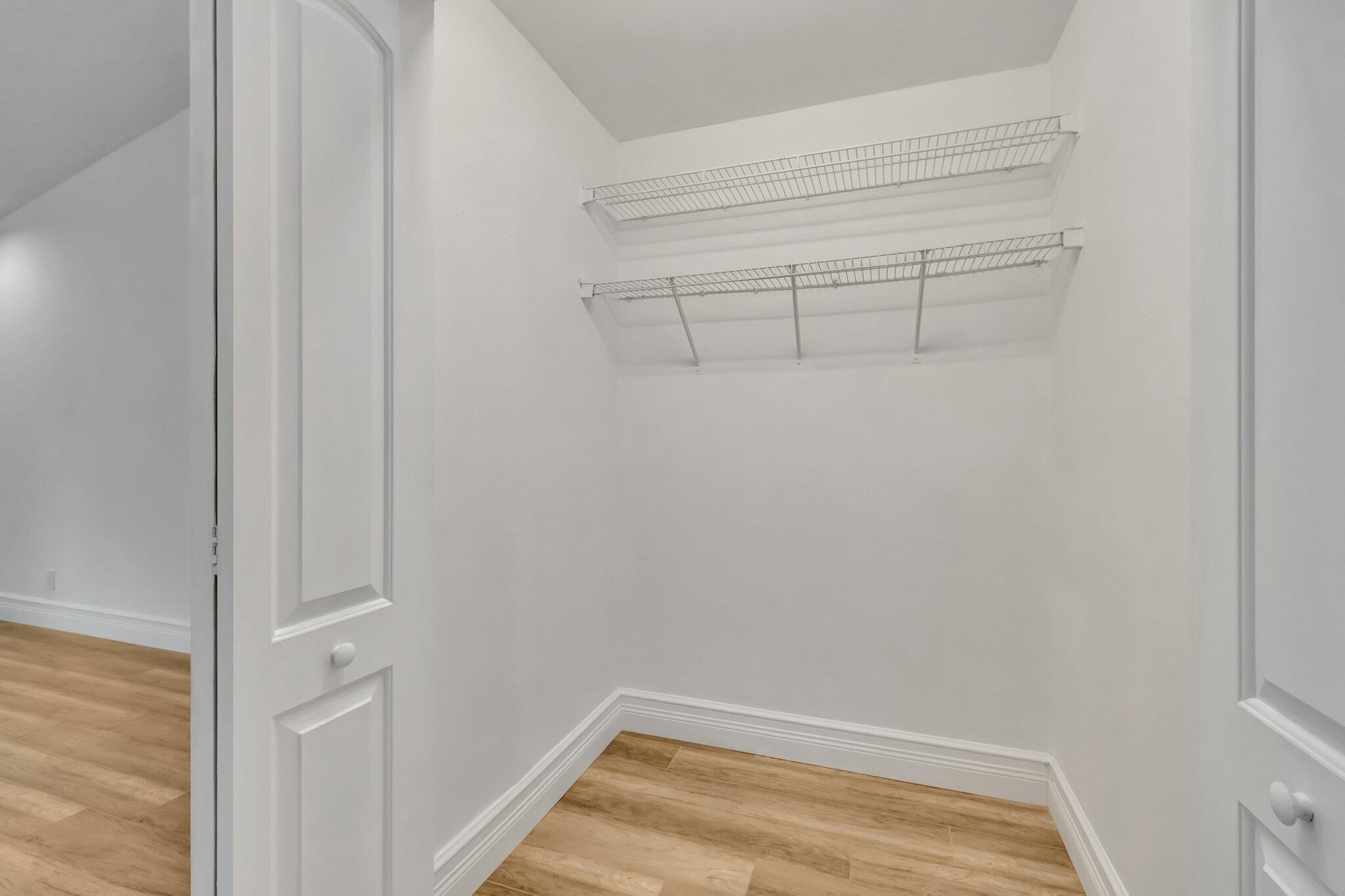 9237 Vineland Court, Unit F Boca Raton, FL 33496 - Photo 35 of 53 PRIMARY LARGE CLOSET