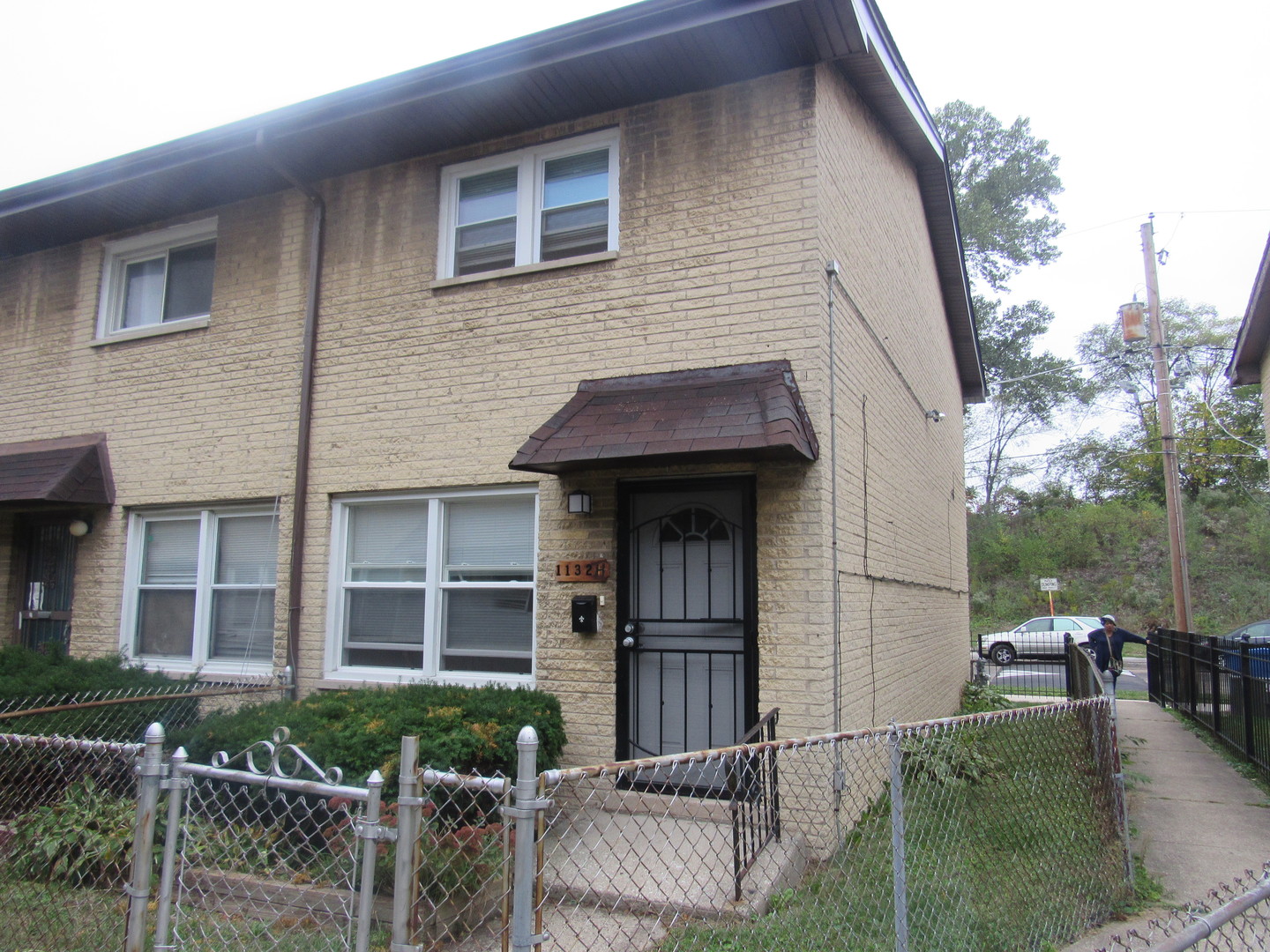 a view of house with outdoor seating area