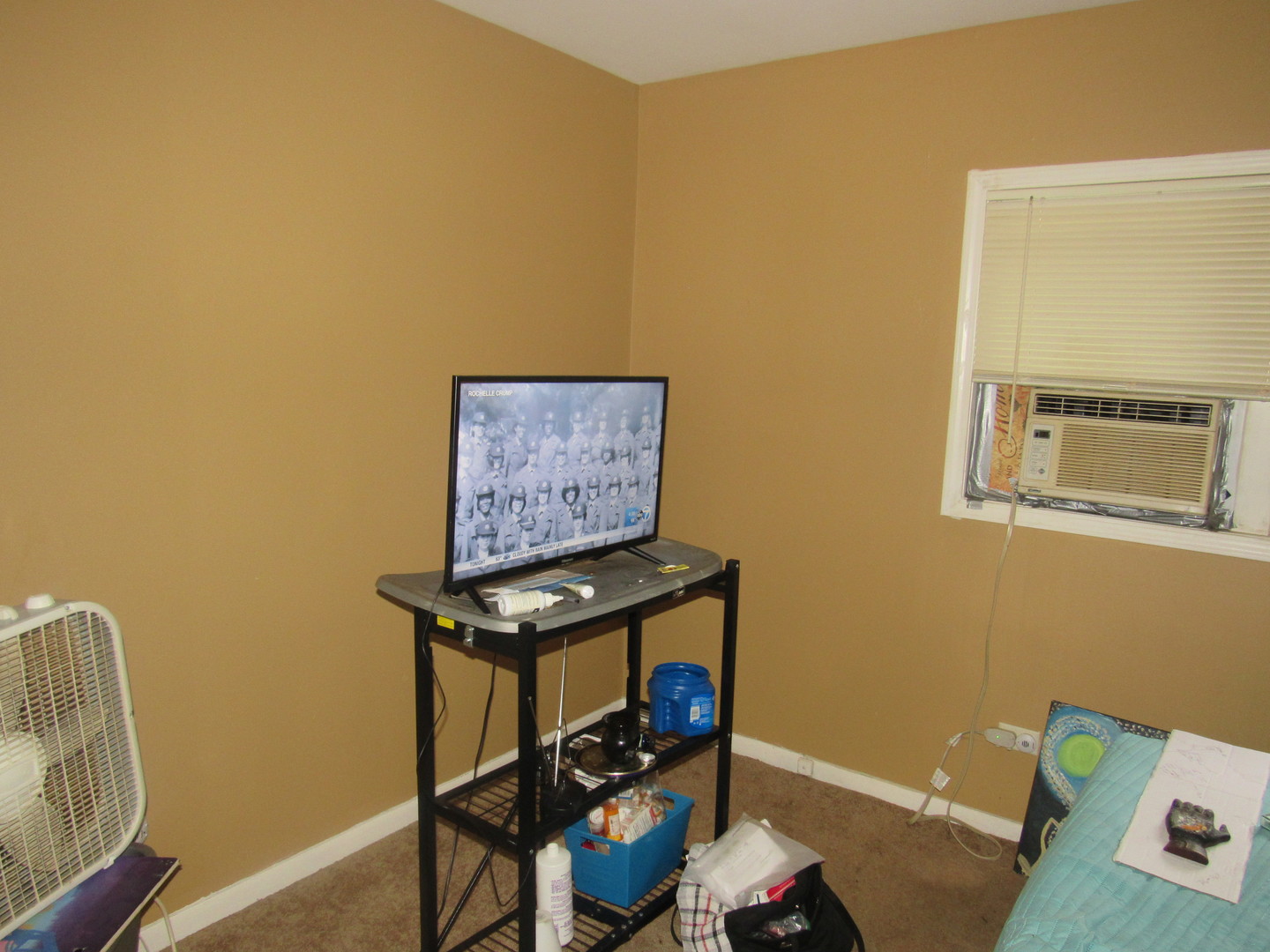 1132 East 81st Street, Unit H Chicago, IL 60619 - Photo 8 of 19 a room with a wooden floor and a table