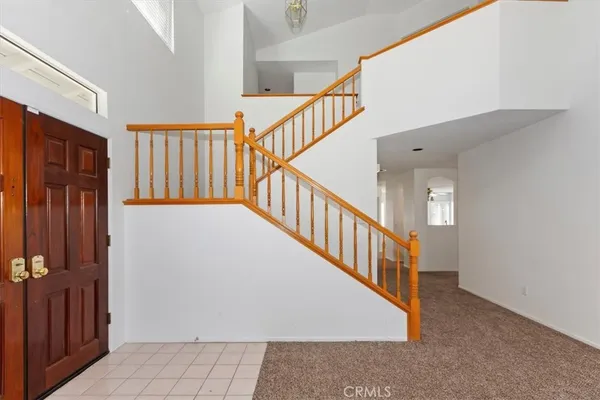 a kitchen that has a sink and a stove in it
