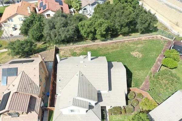 a view of outdoor space with deck and trees