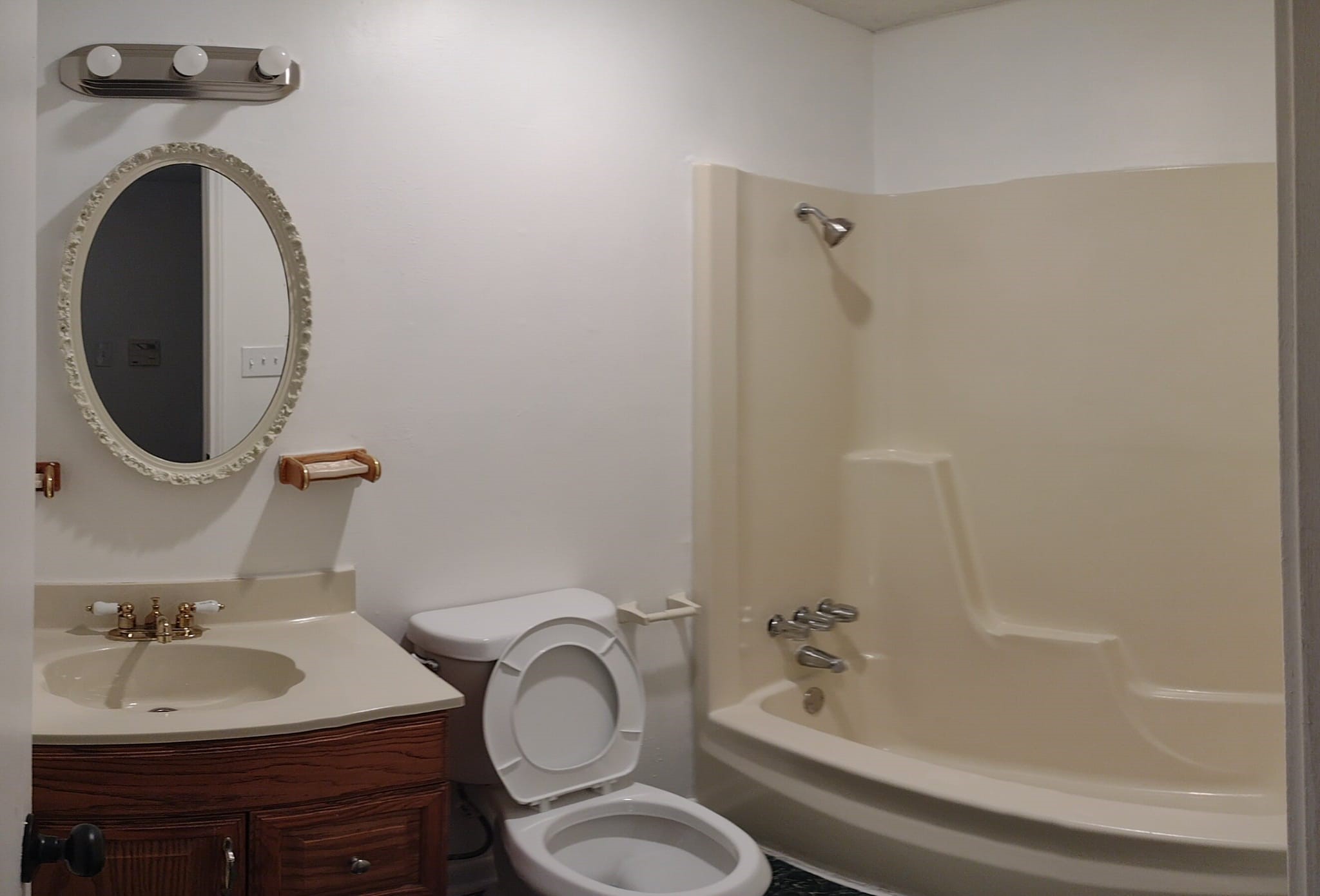 6432 Bankside Drive Houston, TX 77096 - Photo 11 of 14 a bathroom with a granite countertop sink toilet and a mirror