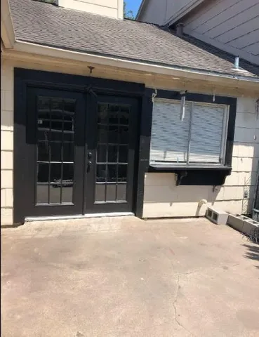 a view of a backyard of a house