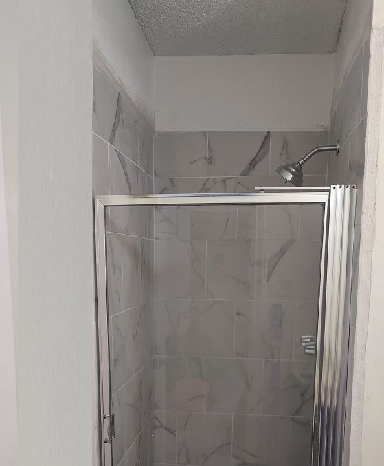 6432 Bankside Drive Houston, TX 77096 - Photo 8 of 14 a view of a refrigerator in kitchen