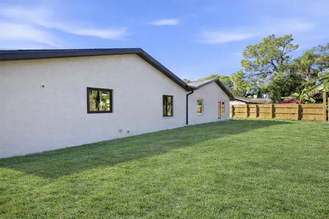 a view of a backyard with a garden