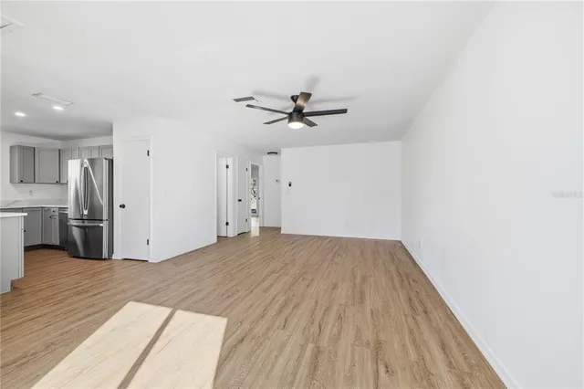 a view of a livingroom with a hardwood floor