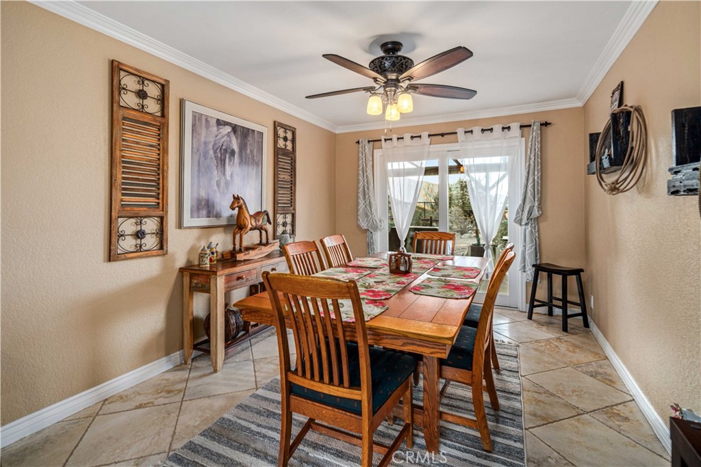 2862 Calmgarden Road Acton, CA 93510 - Photo 15 of 69 a view of a dining room with furniture window and wooden floor