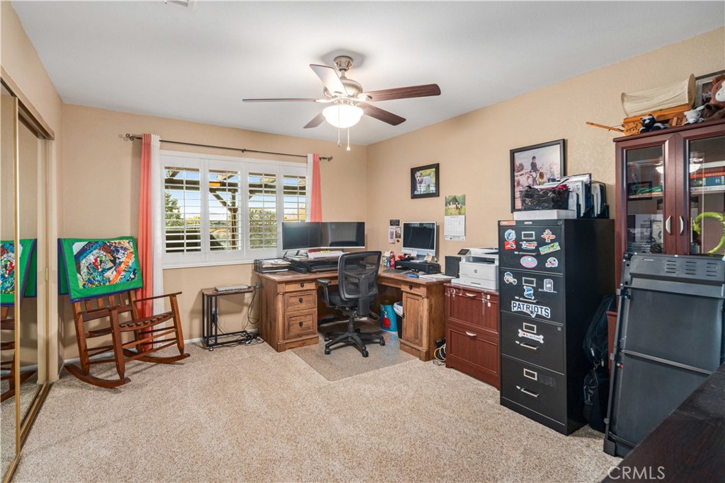 2862 Calmgarden Road Acton, CA 93510 - Photo 30 of 69 a view of a workspace with furniture and a window