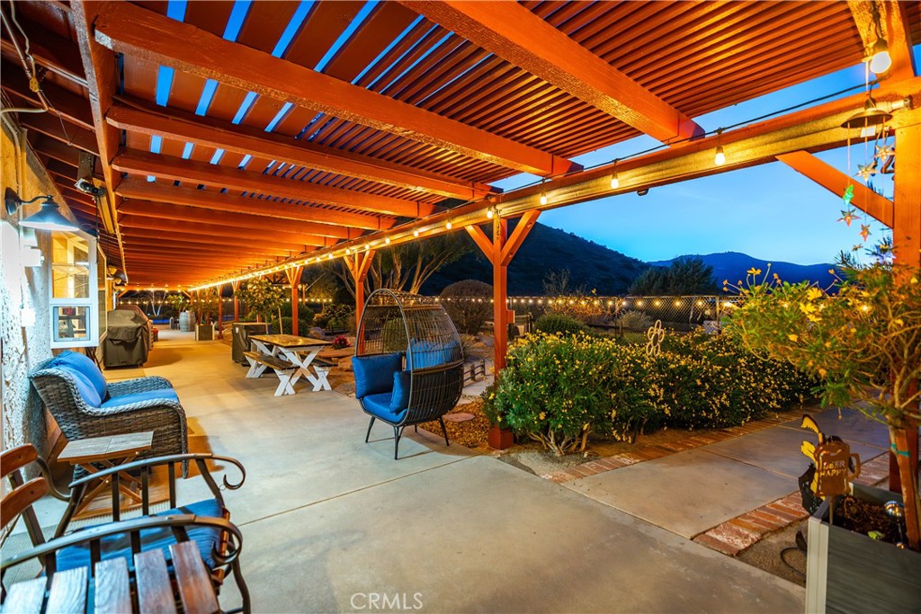 2862 Calmgarden Road Acton, CA 93510 - Photo 32 of 69 a view of swimming pool with outdoor seating