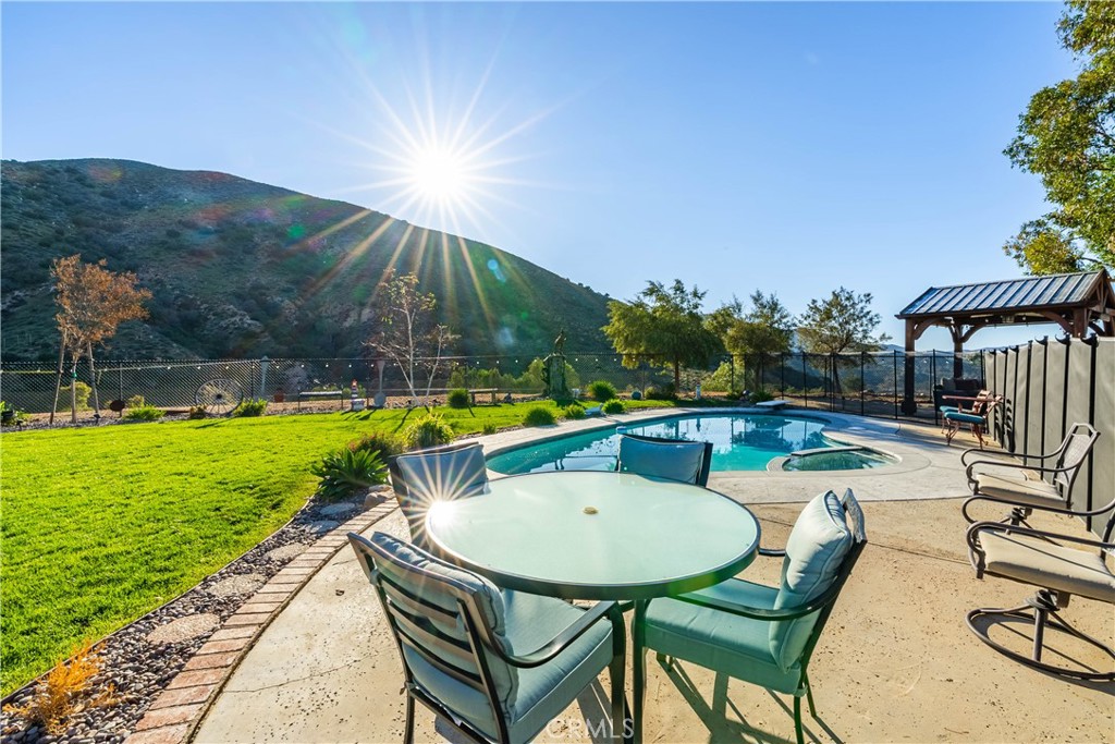 2862 Calmgarden Road Acton, CA 93510 - Photo 47 of 69 a view of swimming pool with a patio