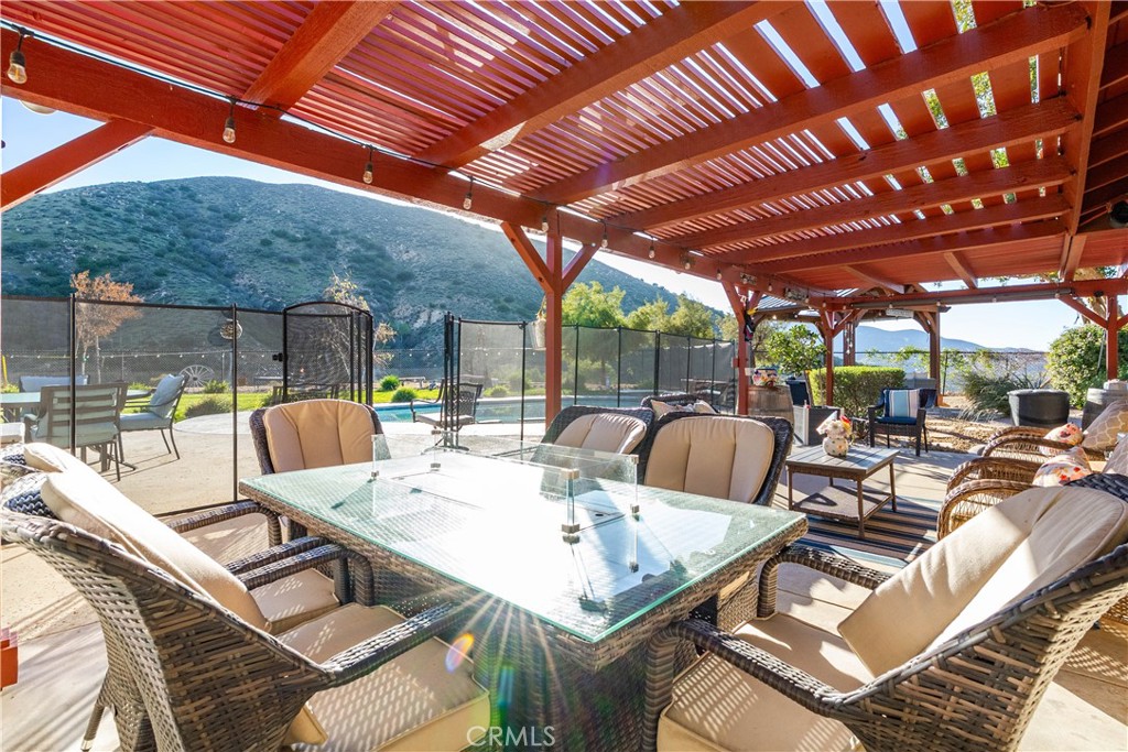 2862 Calmgarden Road Acton, CA 93510 - Photo 49 of 69 a view of a patio with a table and chairs
