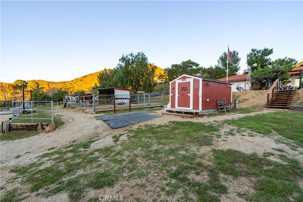 2862 Calmgarden Road Acton, CA 93510 - Photo 57 of 69 a view of a backyard with a tub
