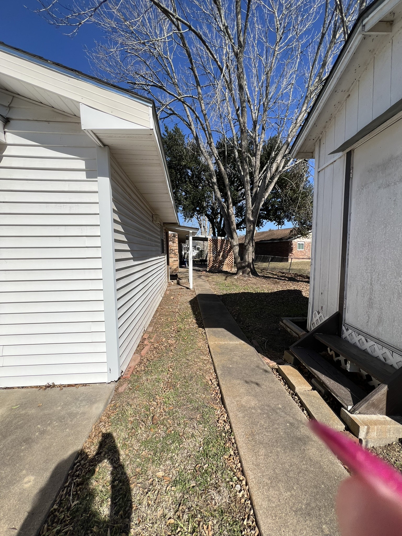 203 Franklin Road Wharton, TX 77488 - Photo 15 of 15 nice sidewalks from garage, office and storage building.