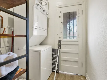 a kitchen with a refrigerator and cabinets