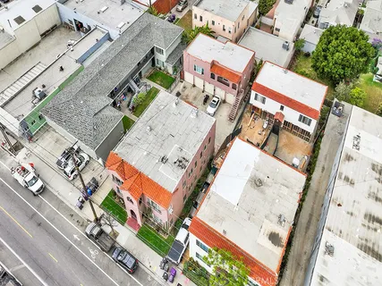 an aerial view of a backyard with a table and chairs
