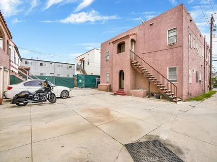 a view of a car park in front of house
