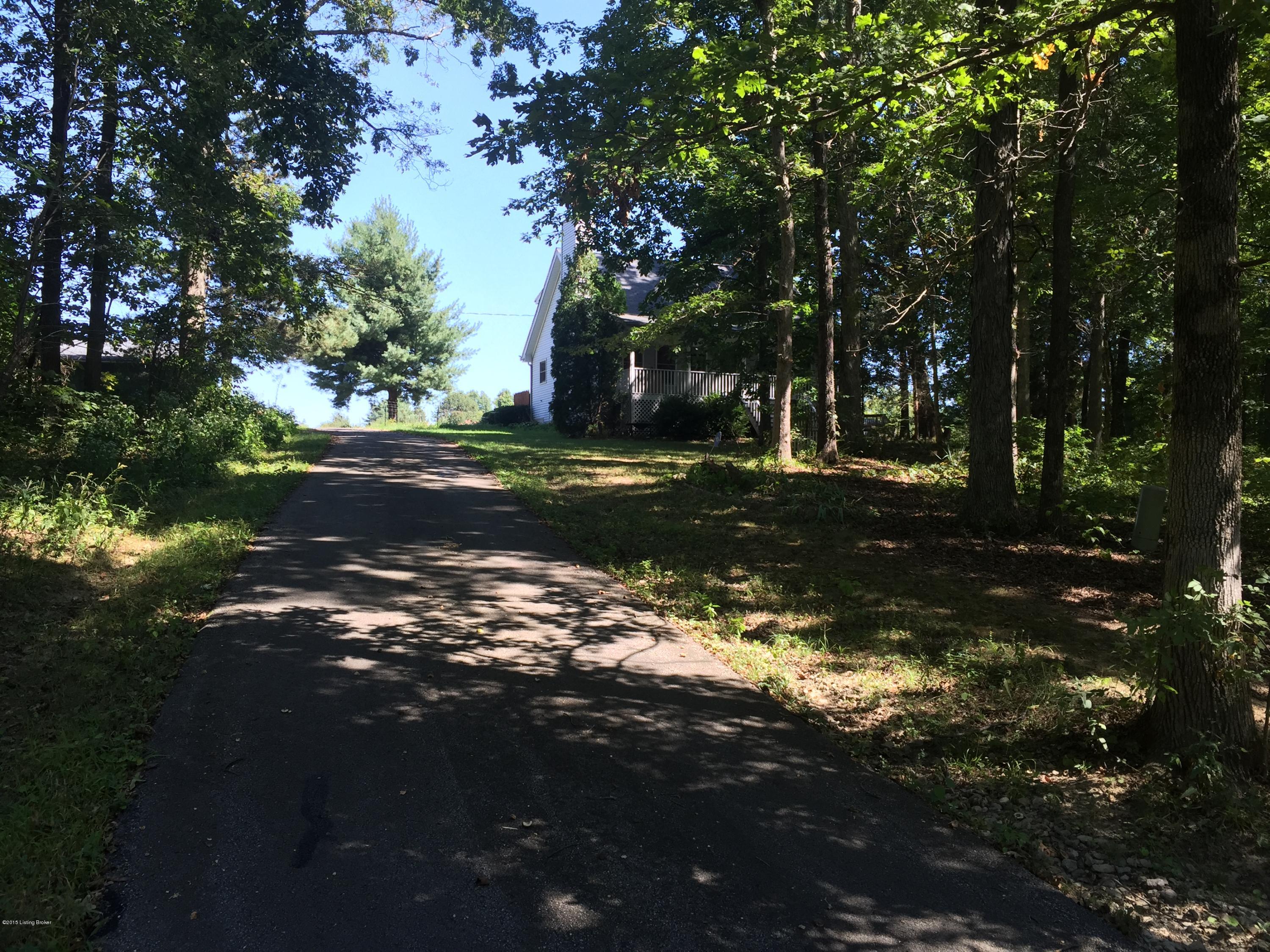 1905 Hunters Trace Road La Grange, KY 40031 - Photo 2 of 15 Drive up to this secluded Cape Cod dollhouse and cleared pasture.