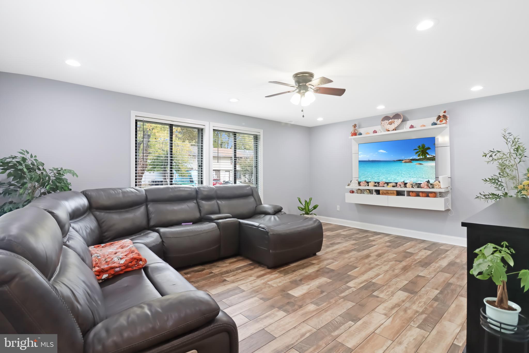725 Myrtle Avenue Lindenwold, NJ 08021 - Photo 5 of 29 a living room with furniture and a large window