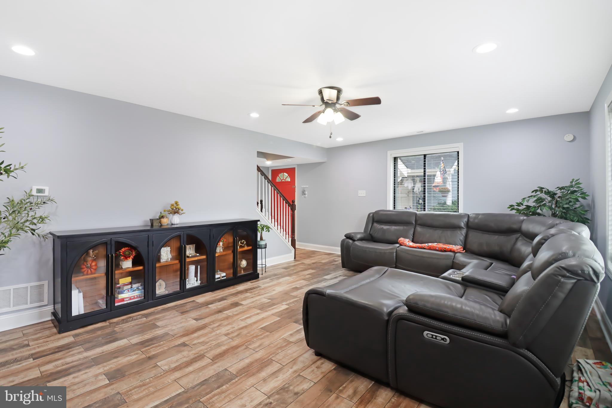 725 Myrtle Avenue Lindenwold, NJ 08021 - Photo 7 of 29 a living room with furniture and a wooden floor