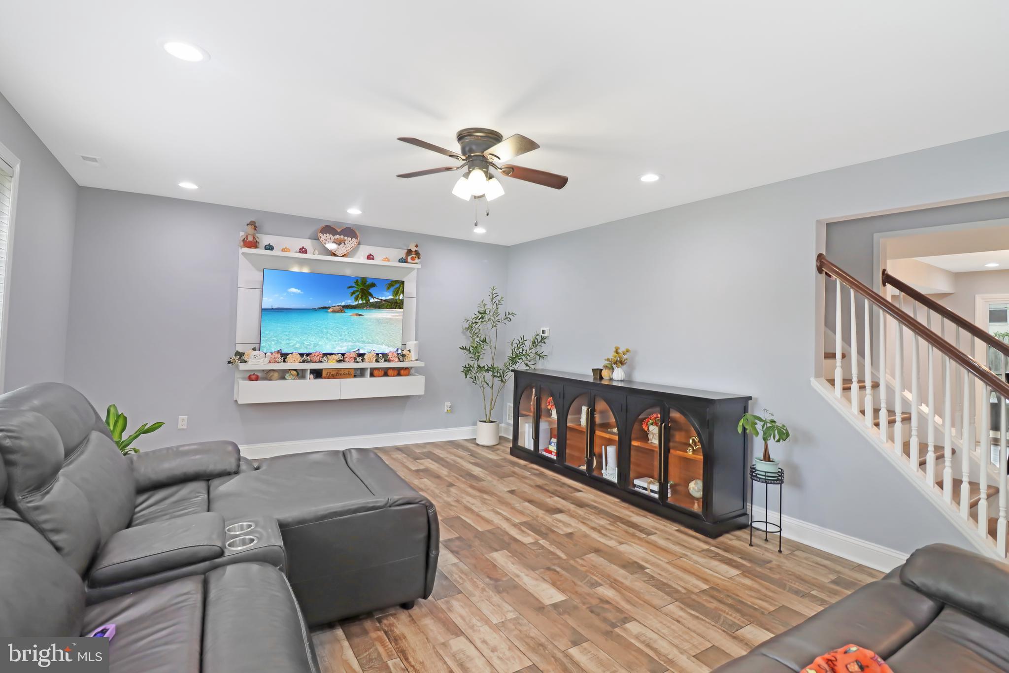 725 Myrtle Avenue Lindenwold, NJ 08021 - Photo 9 of 29 a living room with furniture and a window