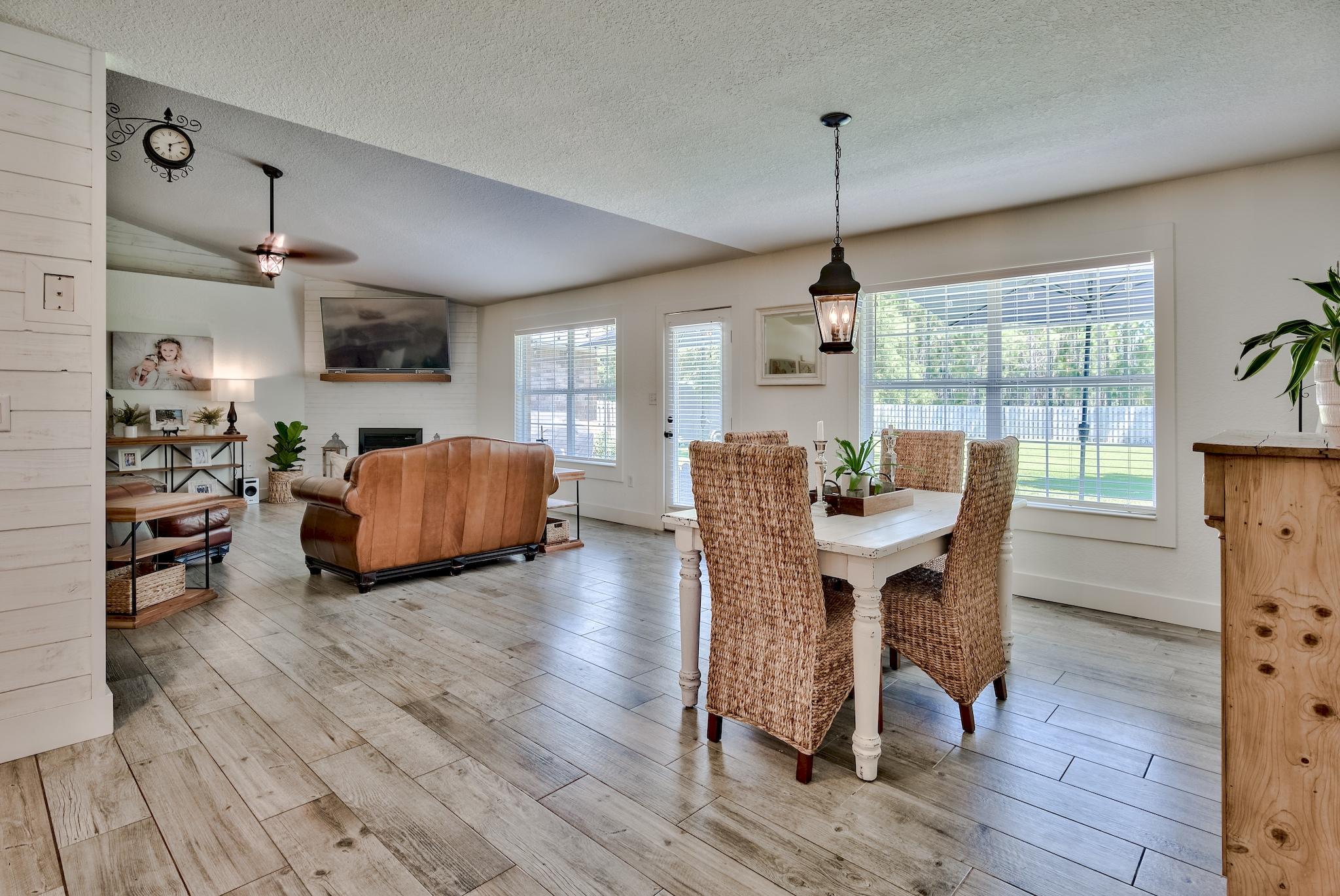 43 East Shipwreck Road Santa Rosa Beach, FL 32459 - Photo 14 of 40 a view of a dining room with furniture window and wooden floor