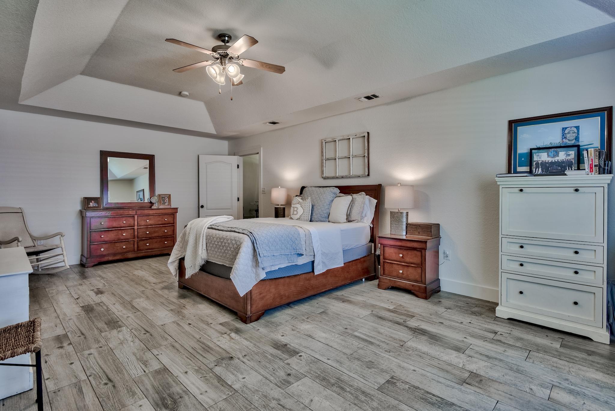 43 East Shipwreck Road Santa Rosa Beach, FL 32459 - Photo 18 of 40 a bedroom with a bed and dresser