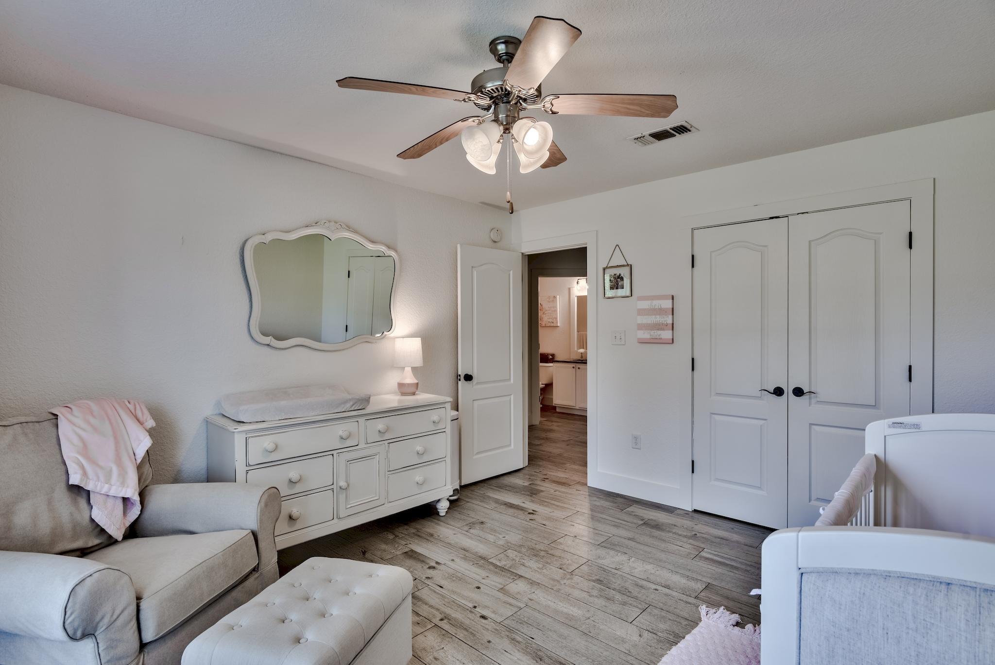 43 East Shipwreck Road Santa Rosa Beach, FL 32459 - Photo 30 of 40 a living room with furniture and a wooden floor