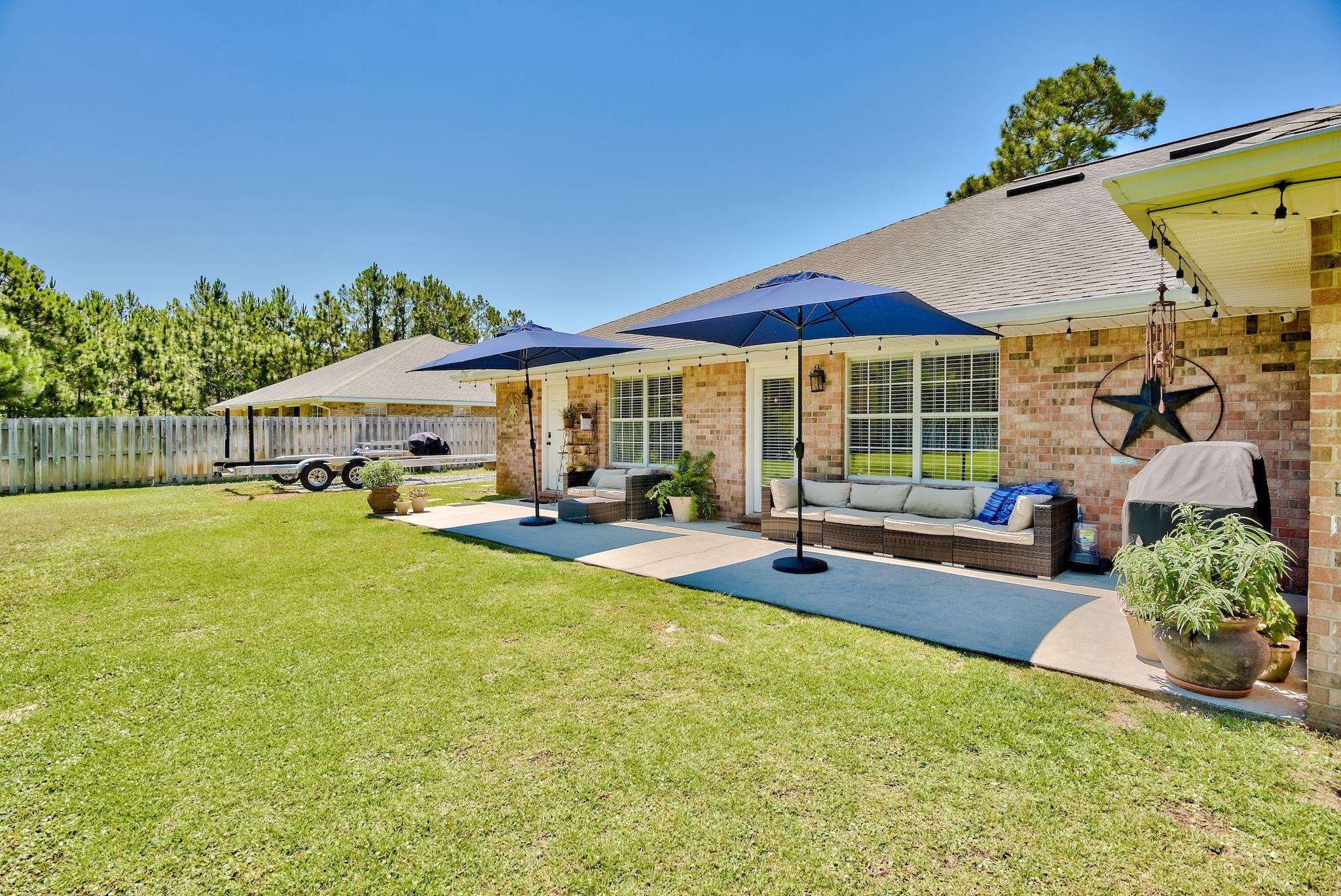 43 East Shipwreck Road Santa Rosa Beach, FL 32459 - Photo 33 of 40 a view of a house with swimming pool and sitting area