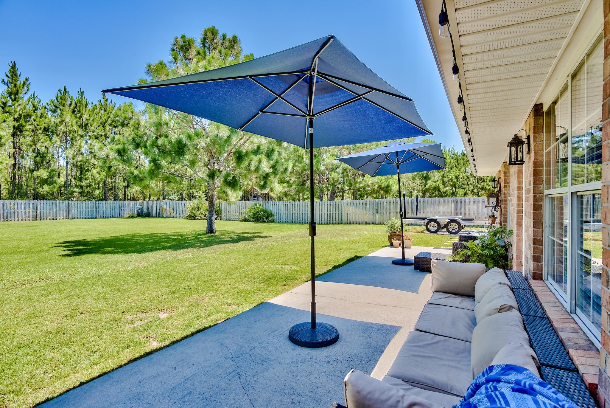 43 East Shipwreck Road Santa Rosa Beach, FL 32459 - Photo 34 of 40 a view of a backyard with swimming pool