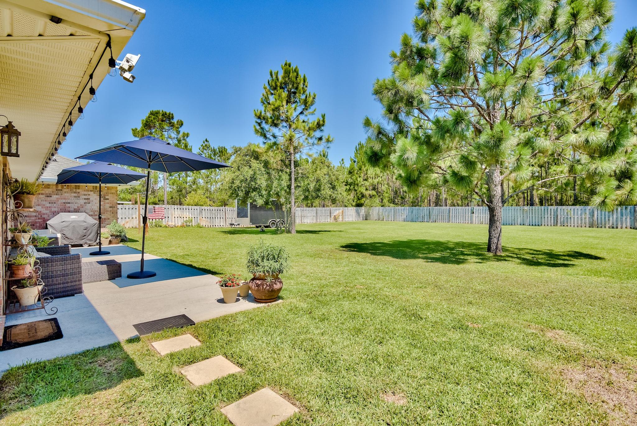 43 East Shipwreck Road Santa Rosa Beach, FL 32459 - Photo 35 of 40 a view of a garden with an outdoor space