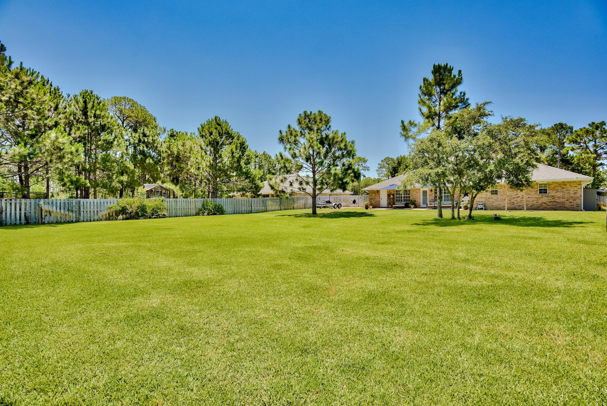 43 East Shipwreck Road Santa Rosa Beach, FL 32459 - Photo 36 of 40 a view of garden with trees