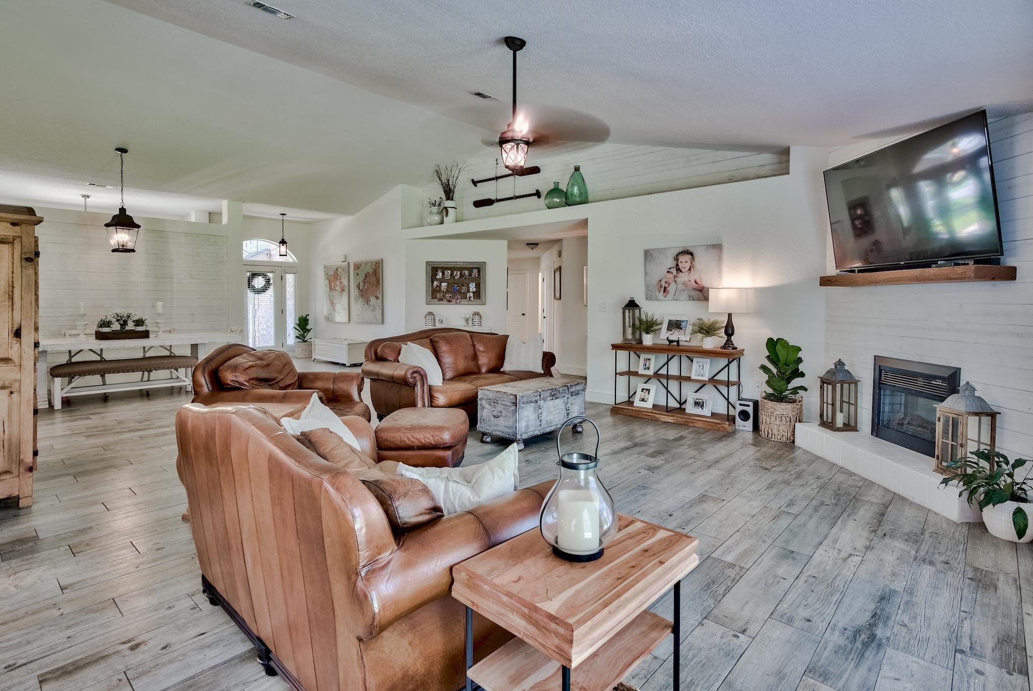 43 East Shipwreck Road Santa Rosa Beach, FL 32459 - Photo 5 of 40 a living room with furniture a flat screen tv and kitchen view