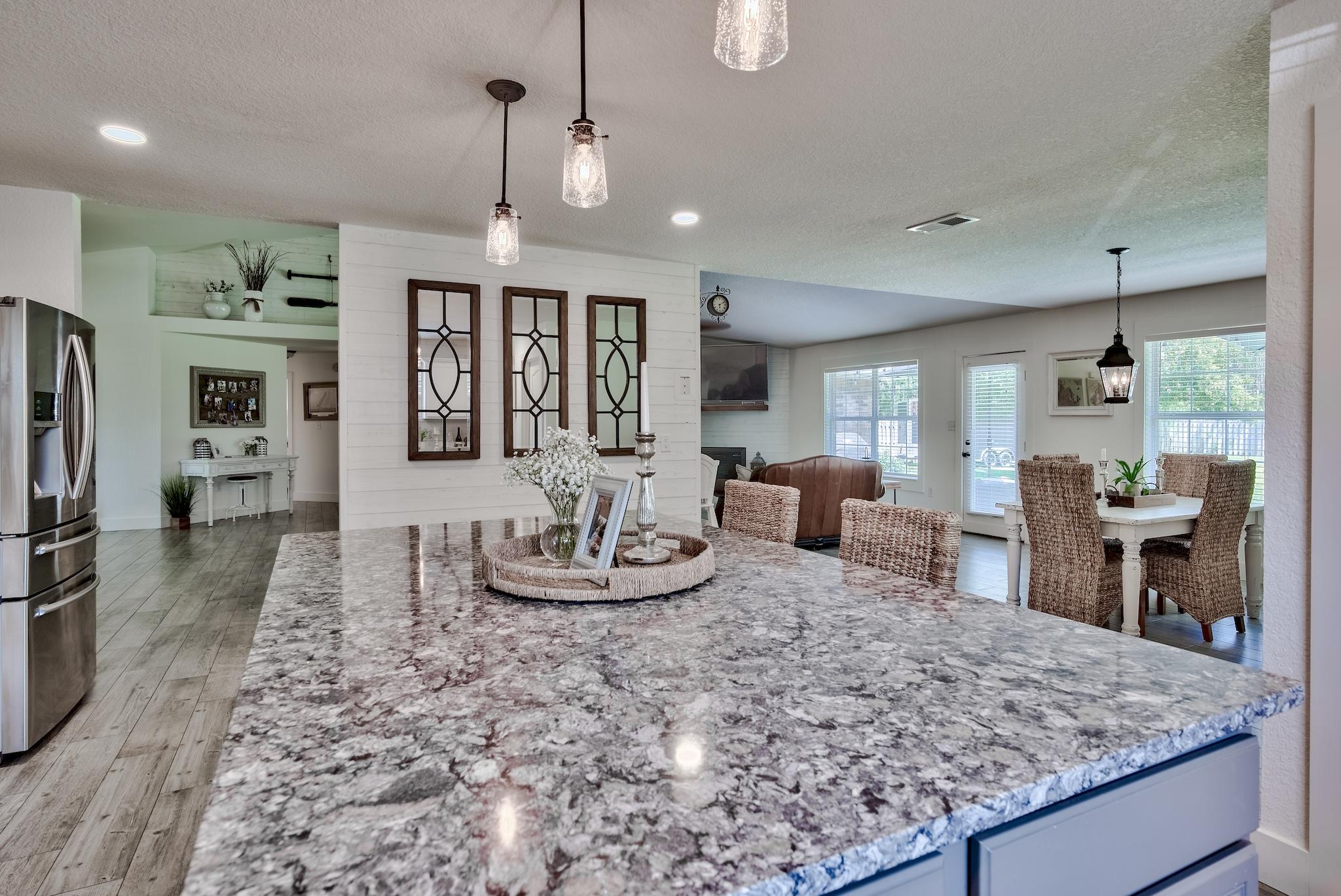 43 East Shipwreck Road Santa Rosa Beach, FL 32459 - Photo 10 of 40 a large kitchen with a table and chairs