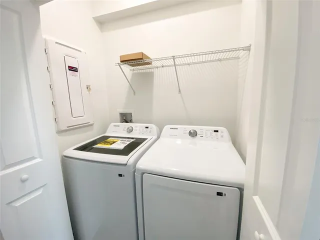 a view of a swimming pool with an outdoor space and seating area