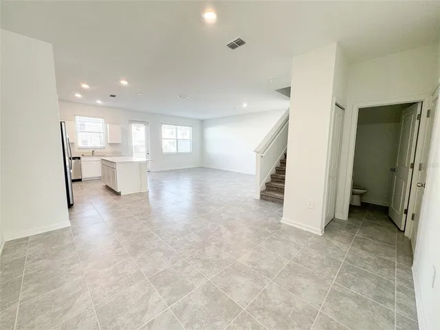 a view of a kitchen and a windows